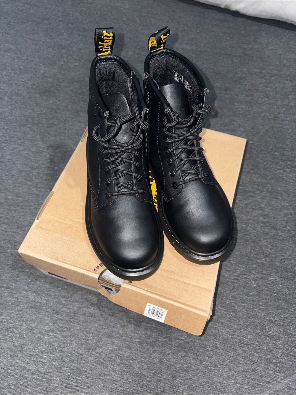 Dr. Martens Girls Black Leather Lace-Up Combat Boots with Yellow Pull Tabs